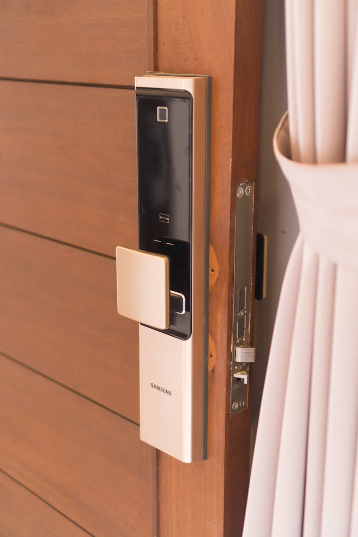 digital Close-up of a smart door lock system, offering enhanced security on a wooden door.